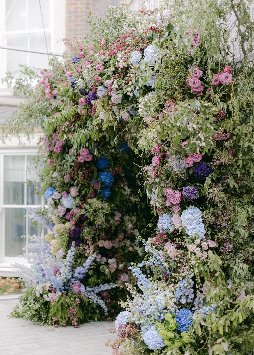 BEST WEDDING PLANNER UK EPIC FLORAL ARCH ENTRANCE